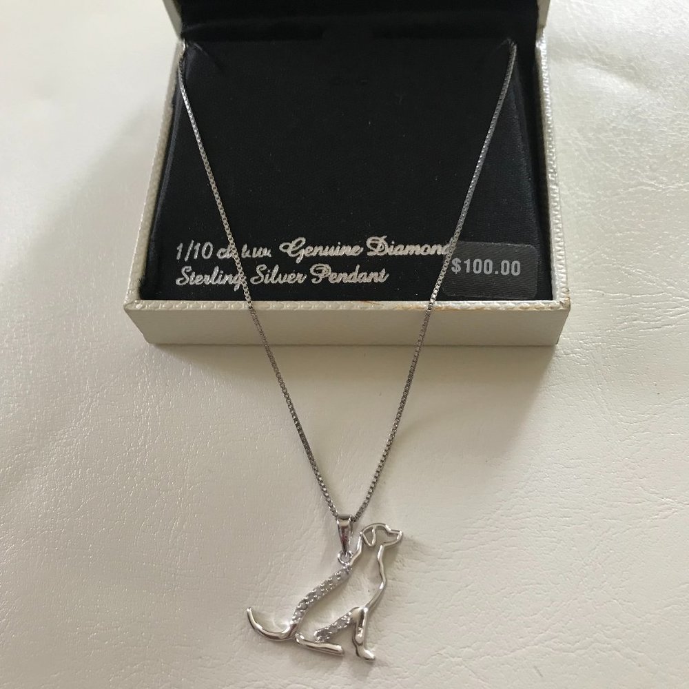 Stirling silver dog necklace with diamonds.